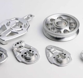 CNC Milled Parts: Close-up of various CNC milled aluminum parts