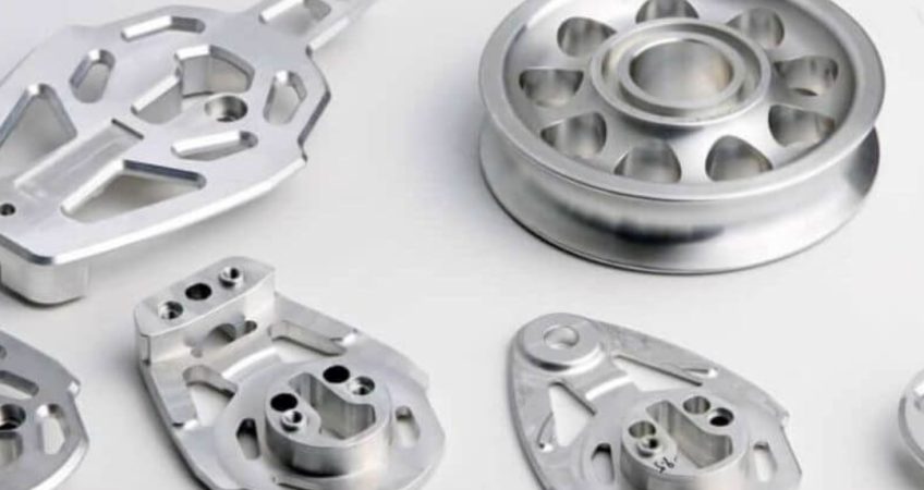 CNC Milled Parts: Close-up of various CNC milled aluminum parts